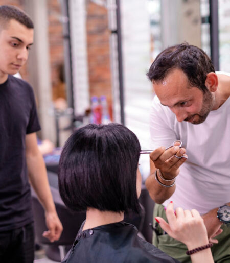hairdresser-cutting-hair-woman-beauty-salon